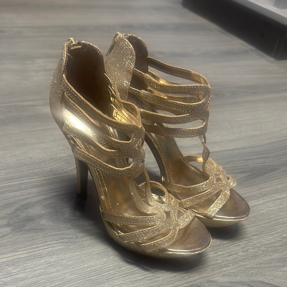 Brash Gold Stiletto Heels with Strappy Design